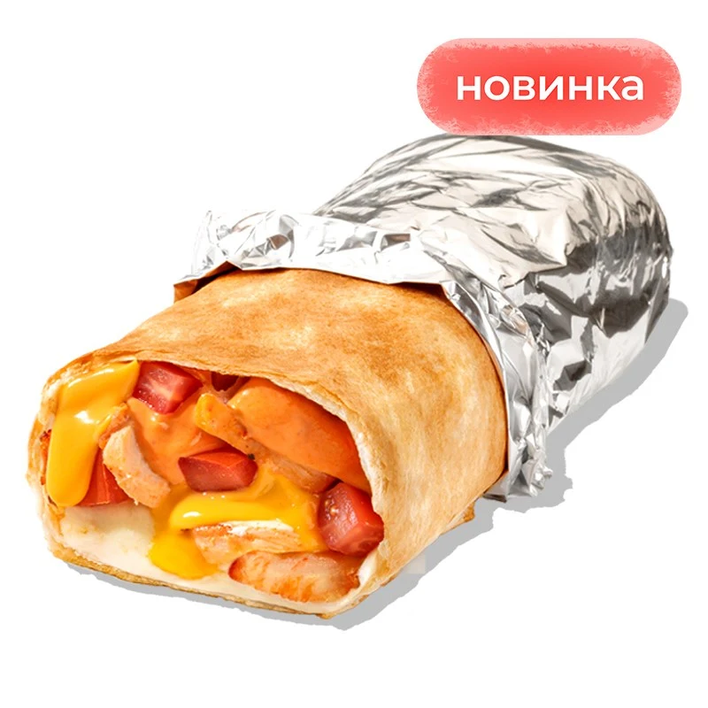 Чикен Ролл Том Ям - Горячая закуска с цыплёнком, свежими томатами, моцареллой, сыром чеддер и пикантным соусом том ям в тонкой пшеничной лепёшке